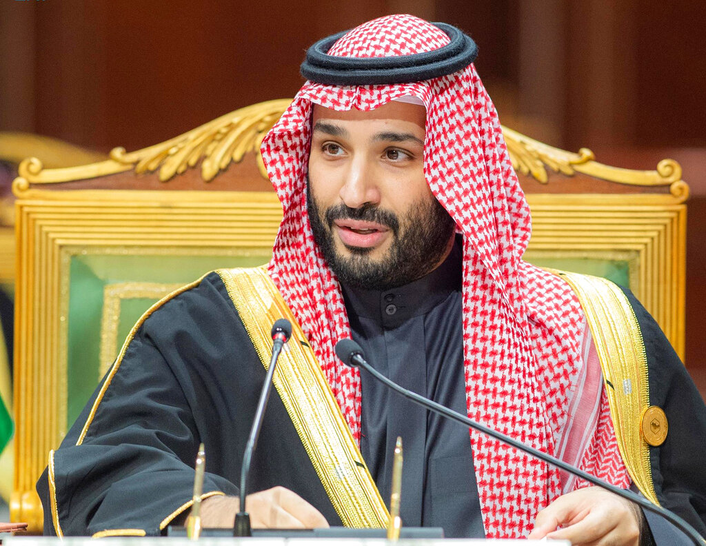 FILE - In this photo released by Saudi Royal Palace, Saudi Crown Prince Mohammed bin Salman, speaks during the Gulf Cooperation Council (GCC) Summit in Riyadh, Saudi Arabia, Dec. 14, 2021. After President Joe Biden took office, his administration made clear the president would avoid direct engagement with the country's defacto leader, Crown Prince Mohammed bin Salman, after U.S. intelligence officials concluded that he likely approved the 2018 killing and dismemberment of U.S.-based journalist Jamal Khashoggi.