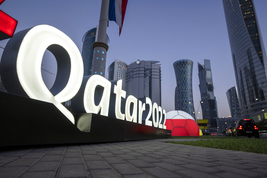 World Cup branding is displayed near the Doha Exhibition and Convention Center.