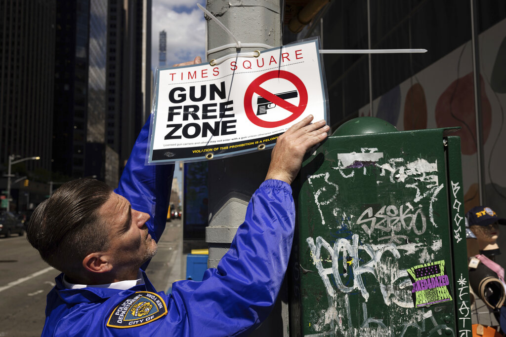 A 'Gun Free Zone' sign at Times Square.
