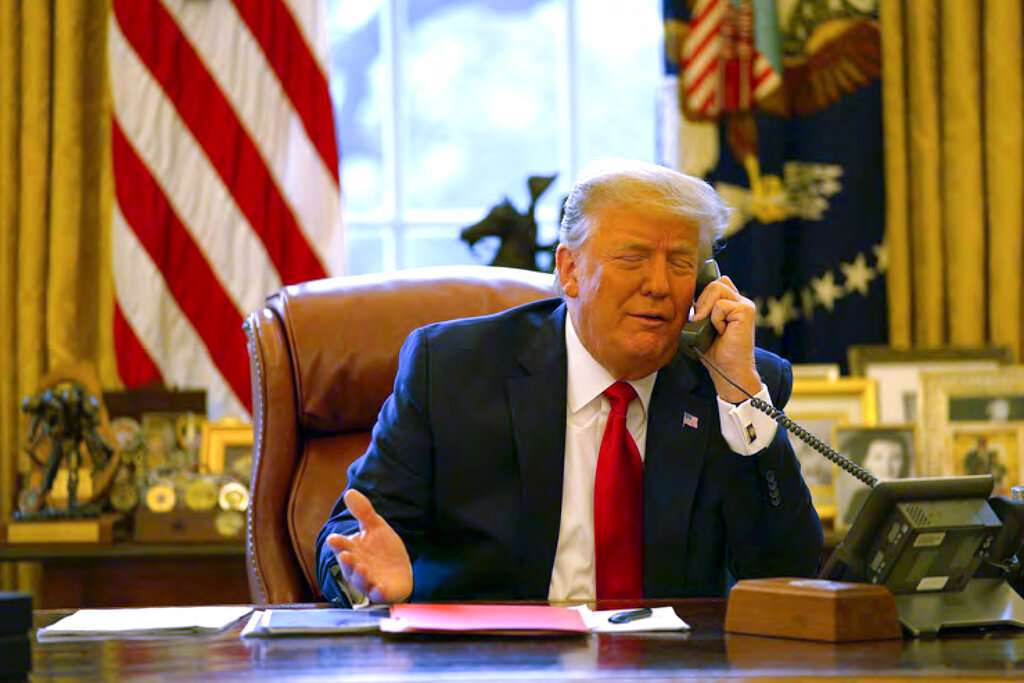 President Trump talks on the phone to Vice President Pence from the Oval Office on January 6, 2021.