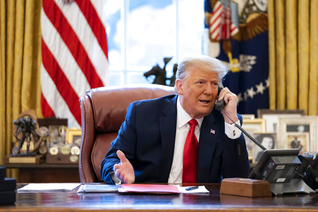 President Trump talks on the phone to Vice President Pence from the Oval Office on January 6, 2021.