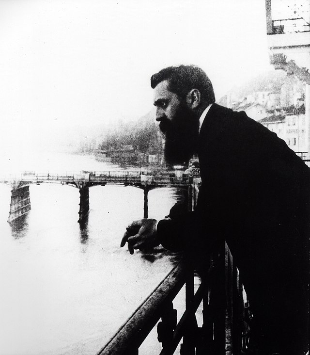 Theodore Herzl on the balcony of the Three Kings Hotel at Basel during the Fifth Zionist Congress. 1901.