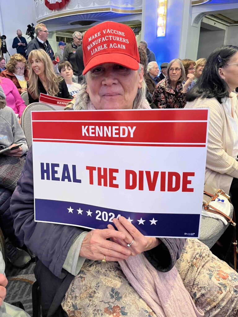 Jean Tobin, of Long Island, New York, turned out for Mr. Kennedy's announcement at Boston Wednesday.