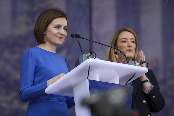 The Moldovan president, Maia Sandu, addresses at rally at the Great National Assembly Square at Chisinau, May 21, 2023. The European Parliament president, Roberta Metsola, applauds.