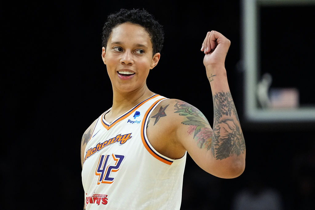 Phoenix Mercury center Brittney Griner smiles during the first half of a WNBA preseason basketball game against the Los Angeles Sparks, Friday, May 12, 2023, in Phoenix.