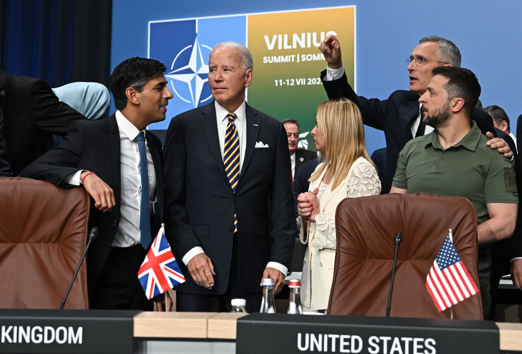 VILNIUS, LITHUANIA - JULY 12: (L-R) Britain's Prime Minister Rishi Sunak, US President Joe Biden, Italy's Prime Minister Giorgia Meloni, NATO Secretary General Jens Stoltenberg and Ukraine's President Volodymyr Zelensky attend a meeting of the NATO-Ukraine Council during the NATO Summit on July 12, 2023 in Vilnius, Lithuania. The summit is bringing together NATO members and partner countries heads of state from July 11-12 to chart the alliance's future, with Sweden's application for membership and Russia's ongoing war in Ukraine as major topics on the summit agenda. (Photo by