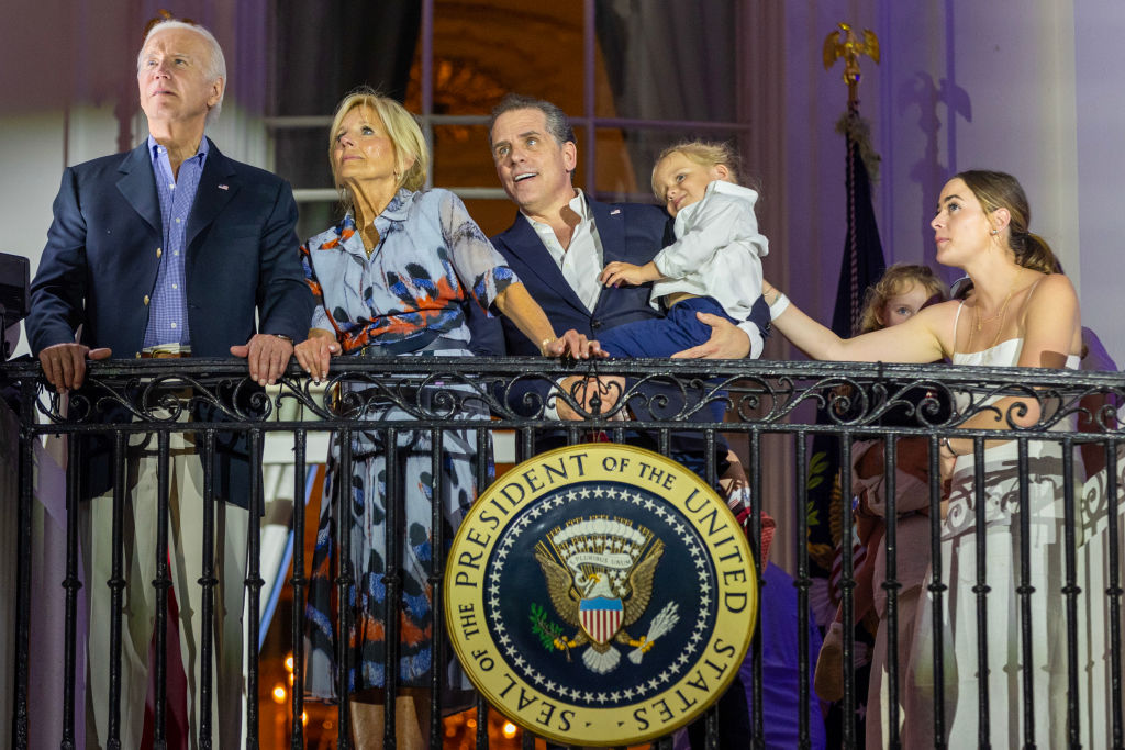 WASHINGTON, DC - JULY 04: (L-R) U.S. President Joe Biden, first lady Jill Biden, Hunter Biden holding Beau Biden and Naomi Biden watch fireworks on the South Lawn of the White House on July 04, 2023 in Washington, DC. The Bidens hosted a Fourth of July BBQ and concert with military families and other guests on the South Lawn of the White House.