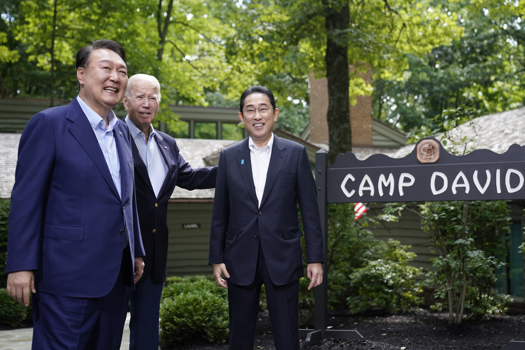 South Korea's President Yoon Suk Yeol, left, President Joe Biden and Japan's Prime Minister Fumio Kishida, right, meet Friday, Aug. 18, 2023, at Camp David, the presidential retreat, near Thurmont, Md.