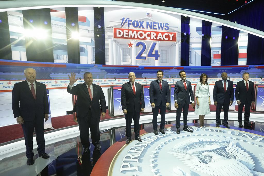 Republican presidential candidates, from left, former Arkansas Gov. Asa Hutchinson, former New Jersey Gov. Chris Christie, former Vice President Mike Pence, Florida Gov. Ron DeSantis, businessman Vivek Ramaswamy, former U.N. Ambassador Nikki Haley, Sen. Tim Scott, R-S.C., and North Dakota Gov. Doug Burgum stand on stage before a Republican presidential primary debate hosted by FOX News Channel Wednesday, Aug. 23, 2023, in Milwaukee. (