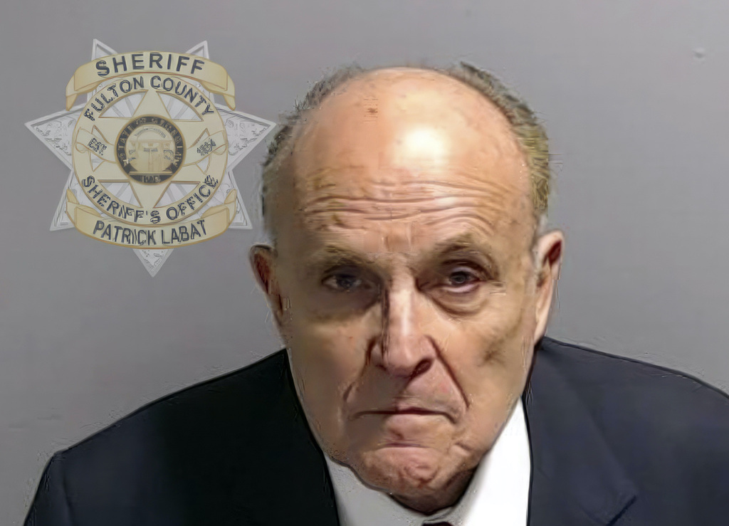 This booking photo provided by the Fulton County Sheriff's Office shows Rudy Giuliani on Wednesday, Aug. 23, 2023, in Atlanta, after he surrendered and was booked. Giuliani is charged alongside former President Donald Trump and 17 others, who are accused by Fulton County District Attorney Fani Willis of scheming to subvert the will of Georgia voters to keep the Republican president in the White House after he lost to Democrat Joe Biden.