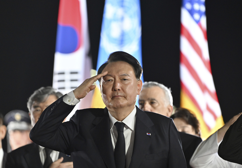 FILE - South Korean President Yoon Suk Yeol salutes during a repatriation ceremony to receive the remains of South Korean soldiers killed in the 1950-53 Korean War, at Seoul Air Base in Seongnam, South Korea, on July 26, 2023. Yoon vowed immediate retaliation against any potential provocation by North Korea in his Armed Forces Day speech Tuesday, Sept. 26, as thousands of troops were set to march through Seoul, the capital, in the first such military parade in 10 years.