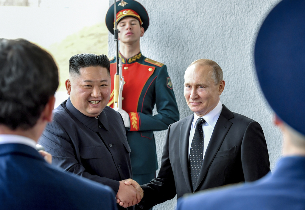 FILE - Russian President Vladimir Putin, center right, and North Korea's leader Kim Jong Un shake hands during their meeting in Vladivostok, Russia, Thursday, April 25, 2019. A North Korean train presumably carrying North Korean leader Jong Un has departed for Russia for a possible meeting with Russian President Putin, South Korean media said Monday, Sept. 11, 2023. Citing unidentified South Korean government sources, the Chosun Ilbo newspaper reported that the train likely left the North Korean capital of Pyongyang on Sunday evening and that a Kim-Putin meeting is possible as early as Tuesday. (