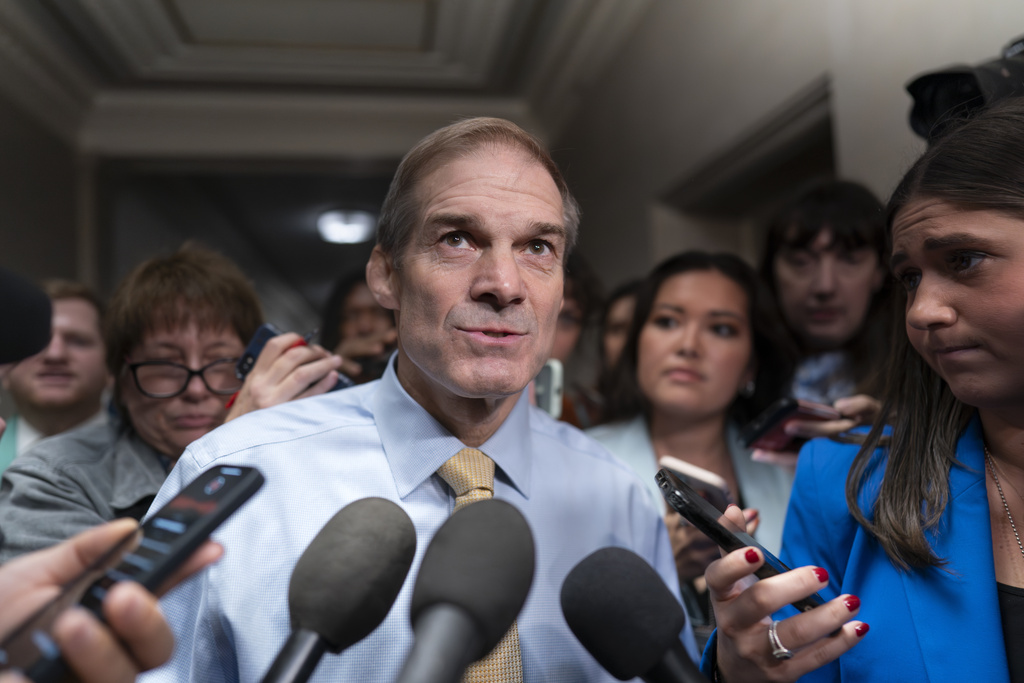 Representative Jim Jordan talks with reporters as House Republicans meet again behind closed doors to find a path to elect a new speaker, at the Capitol, October 13, 2023.