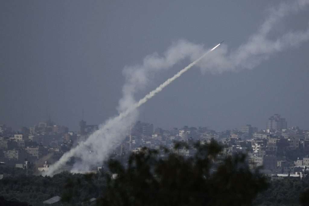 Rockets are fired toward Israel from the Gaza Strip, as seen from southern Israel, Monday, Oct. 16, 2023.