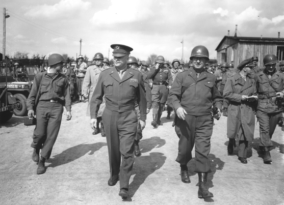 General Dwight Eisenhower and General Troy Middleton tour the newly liberated Ohrdruf concentration camp. General Troy Middleton is commanding general of the VIII Corps, Third U.S. Army.