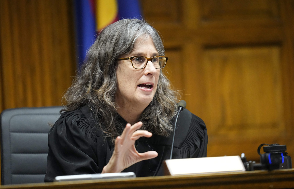 Judge Sarah B. Wallace presides over closing arguments in a hearing for a lawsuit to keep former President Donald Trump off the state ballot, Wednesday, Nov. 15, 2023, in Denver.
