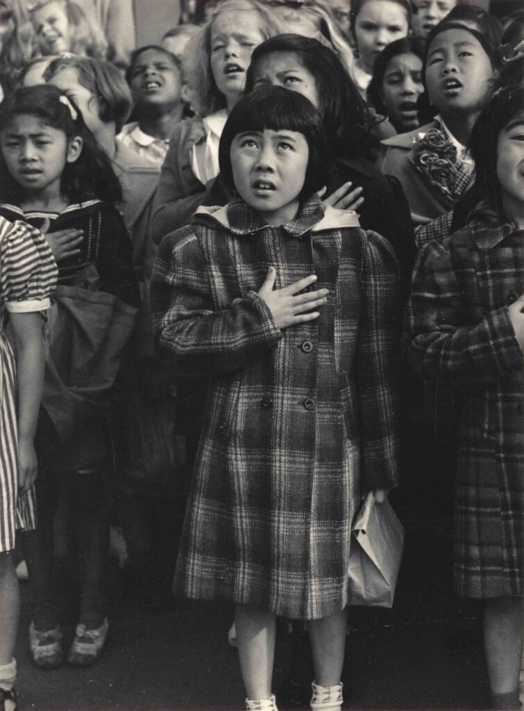 Dorothea Lange Children of the Weill Public School Shown in a Flag Pledge Ceremony, San Francisco, California , April 1942, printed c. 1965 gelatin silver print image: 23.5 x 17.4 cm (9 1/4 x 6 7/8 in.) mat: 18 x 14 in. frame (outside): 19 x 15 in. National Gallery of Art, Washington, Gift of Daniel Greenberg and Susan Steinhauser
