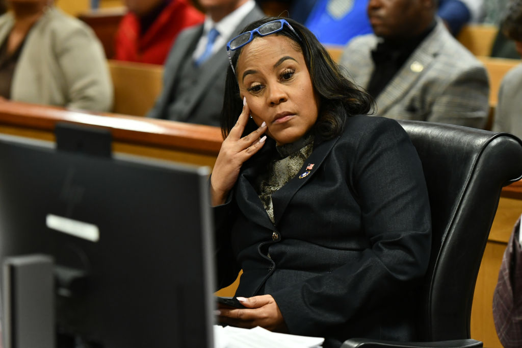ATLANTA, GEORGIA - NOVEMBER 21: Fulton County District Attorney Fani Willis appears before Judge Scott McAfee for a hearing in the 2020 Georgia election interference case at the Fulton County Courthouse on November 21, 2023 at Atlanta.