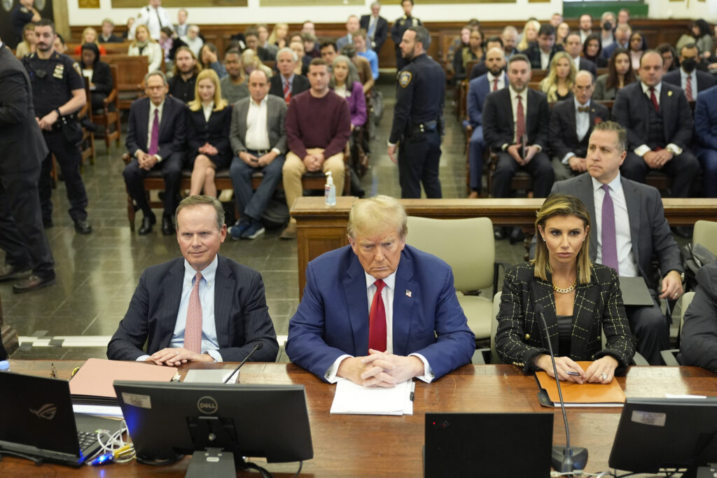 President Trump is flanked by his attorneys at his civil fraud trial at New York.