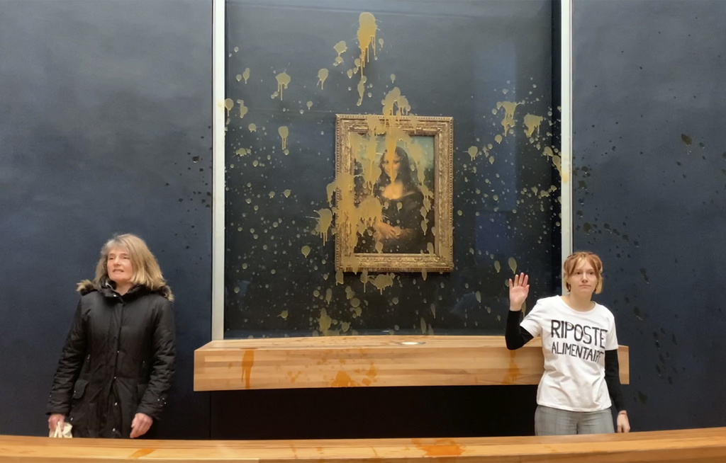 Climate Vandals Hurl Soup at DaVinci's 'Mona Lisa' at the Louvre