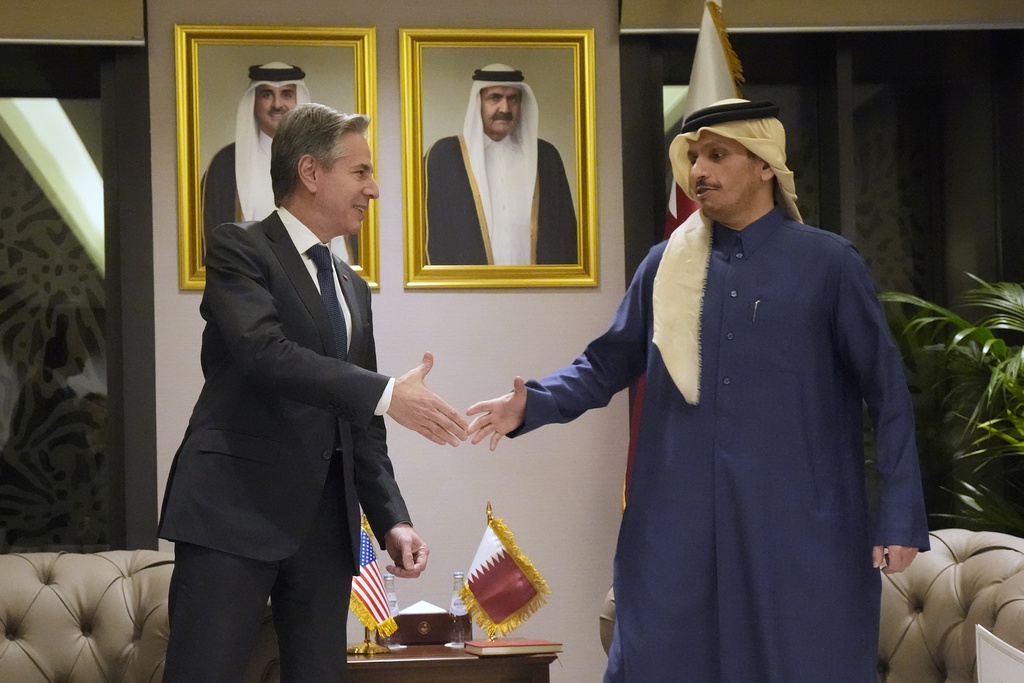 US Secretary of State Antony Blinken, left, shakes hands with Qatar's Prime Minister and Foreign Affairs Minister Mohammed Bin Abdulrahman Al Thani, at Diwan Annex, in Doha, Qatar, Tuesday, Feb. 6, 2024.