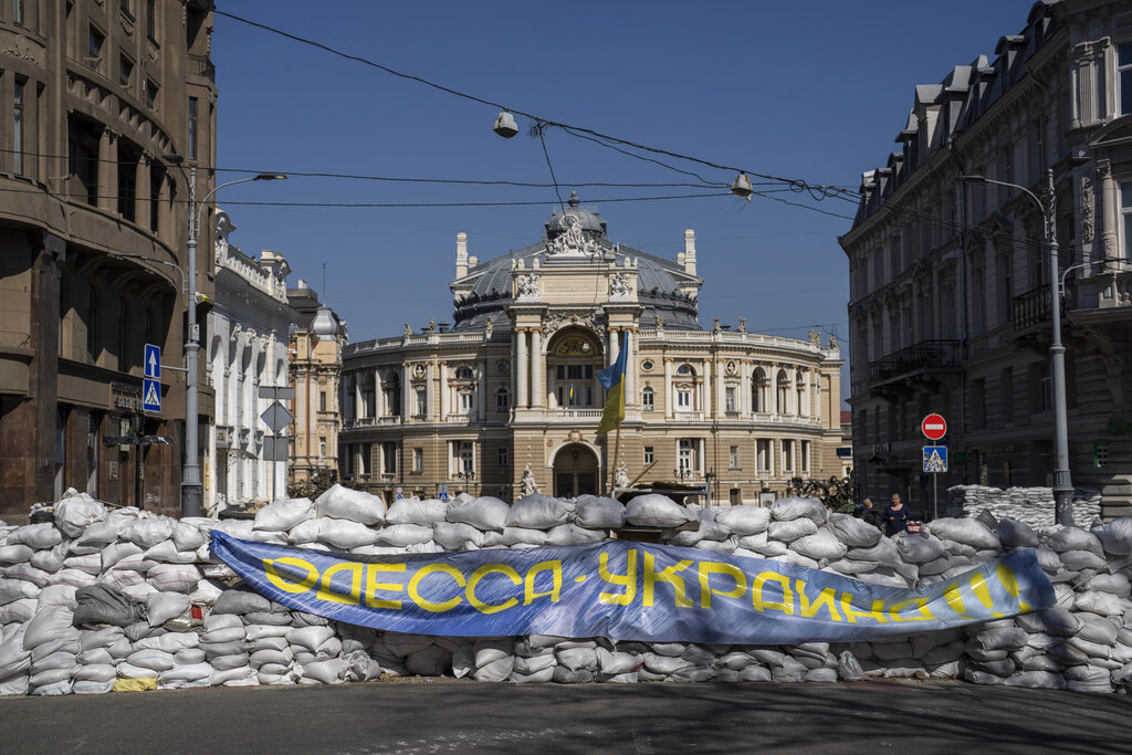 Sandbags block a street in front of the National Academic Theatre of Opera and Ballet building as a preparation for a possible Russian offensive, in Odesa, Ukraine, Thursday, March 24, 2022.