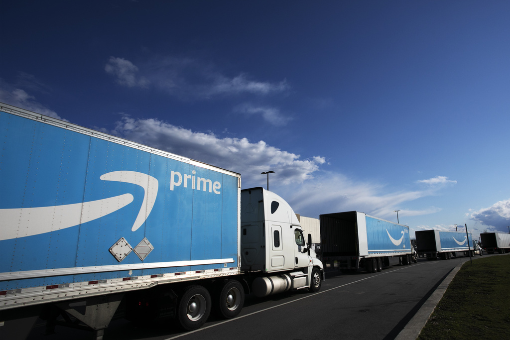 Amazon tractor trailers line up outside the Amazon distribution center on April 21, 2020 on Staten Island at New York.