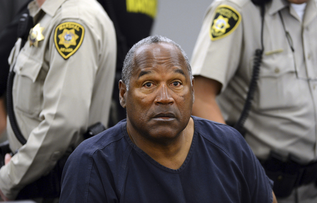 In this May 14, 2013, file photo, O.J. Simpson sits during a break on the second day of an evidentiary hearing at Clark County District Court at Las Vegas.