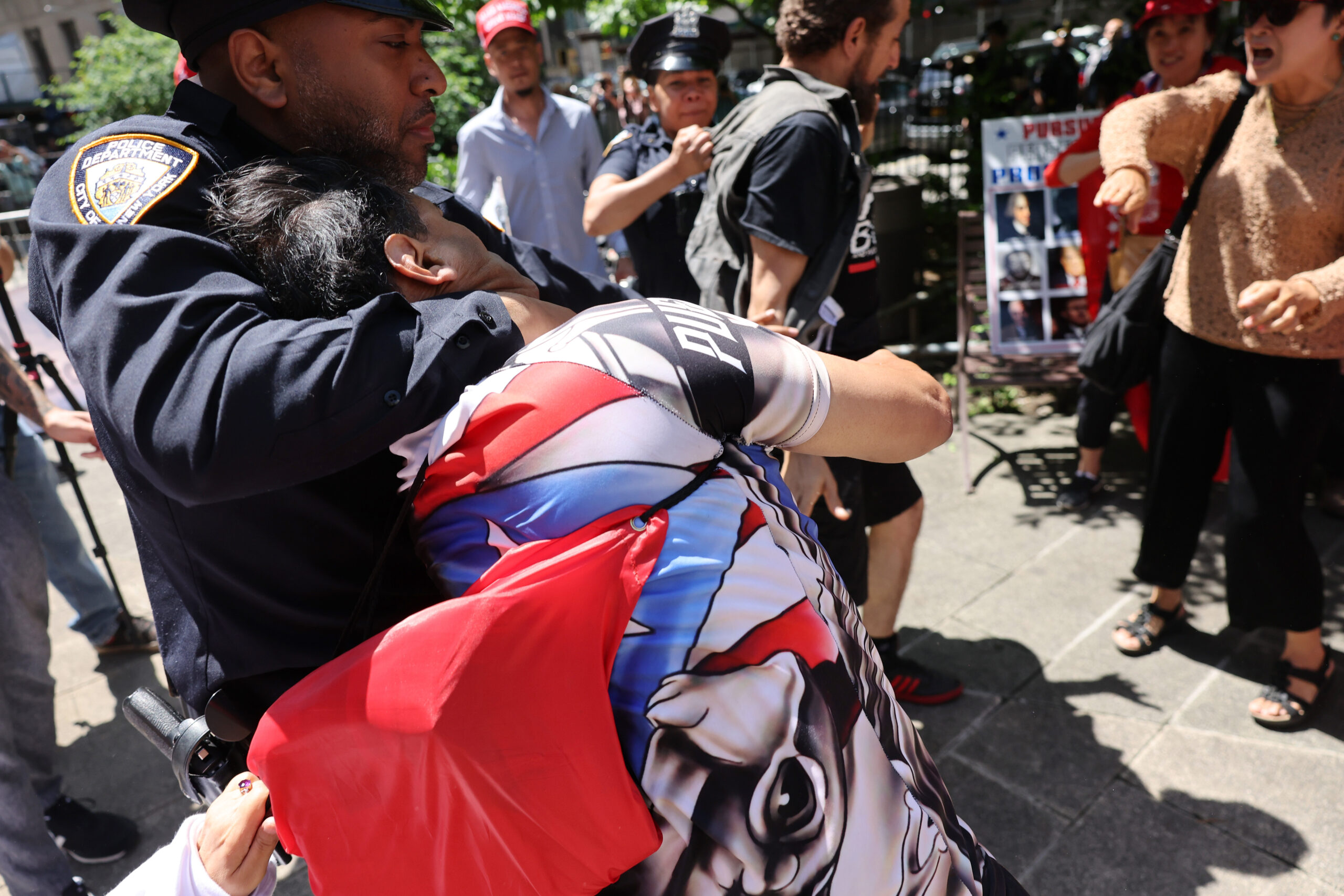 Fists, Insults Fly Outside Courthouse Between Trump’s Supporters and ...