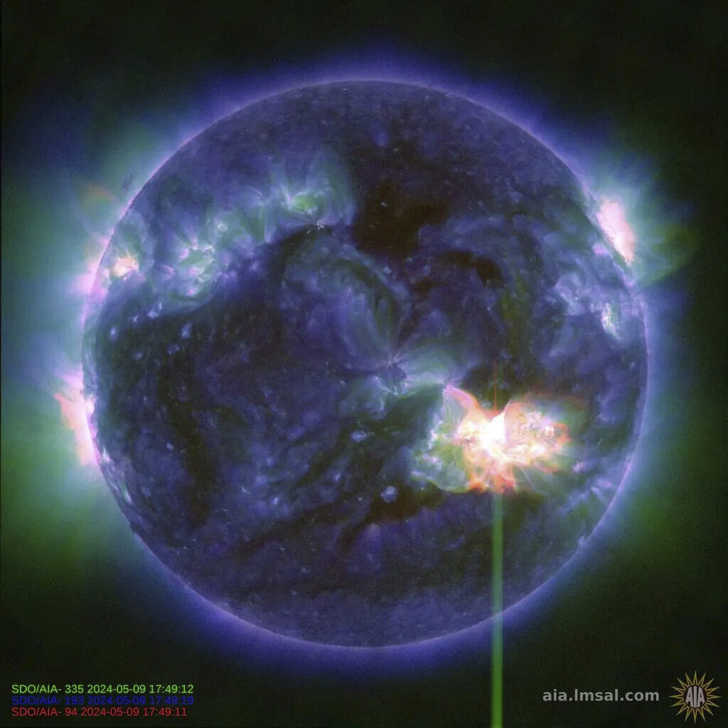 This image provided by NASA shows a solar flare, as seen in the bright flash in the lower right, captured by NASA’s Solar Dynamics Observatory on May 9, 2024. A severe geomagnetic storm watch has been issued for Earth starting Friday and lasting all weekend _ the first in nearly 20 years.