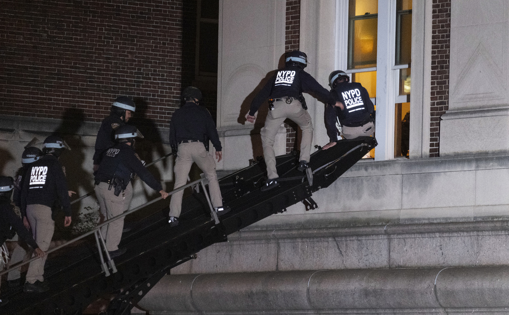 New York City police enter an upper floor of Hamilton Hall on the Columbia University campus using a tactical vehicle, in New York Tuesday, April 30, 2024, after a building was taken over by protesters earlier Tuesday.