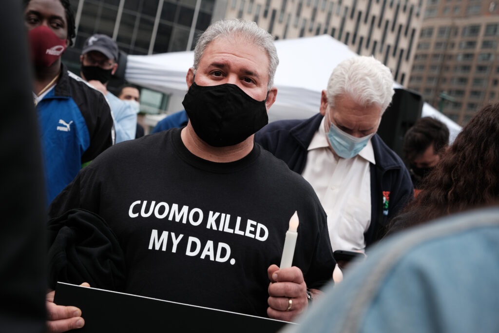 People who've lost loved ones due to Covid-19 while they were in New York nursing homes attend a protest and vigil on March 25, 2021 at New York City.