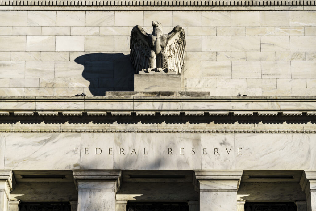 FILE - The Federal Reserve is seen in Washington, on Nov. 16, 2020. The Federal Reserve is expected to signal this week that it will likely reduce borrowing costs as soon as September 2024.