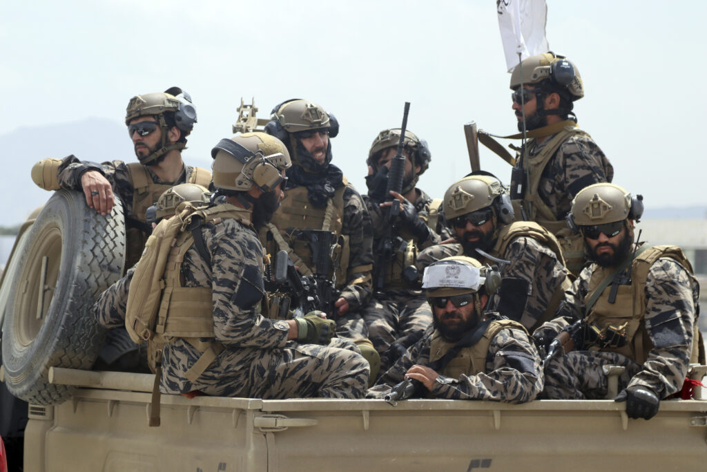 Taliban special forces fighters arrive inside the Hamid Karzai International Airport after the U.S. military's withdrawal, in Kabul, Afghanistan, Tuesday, Aug. 31, 2021. The Taliban were in full control of Kabul's airport on Tuesday, after the last U.S. plane left its runway, marking the end of America's longest war. (AP Photo/Khwaja Tawfiq Sediqi)