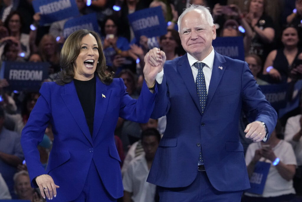 Vice President Kamala Harris and running mate Minnesota Gov. Tim Walz appear at the Fiserv Forum during a campaign rally in Milwaukee, Tuesday, Aug. 20, 2024. (