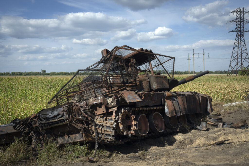 FILE - A destroyed Russian tank sits on a roadside near the town of Sudzha, Russia, in the Kursk region, on Aug. 16, 2024. This image was approved by the Ukrainian Defense Ministry before publication.