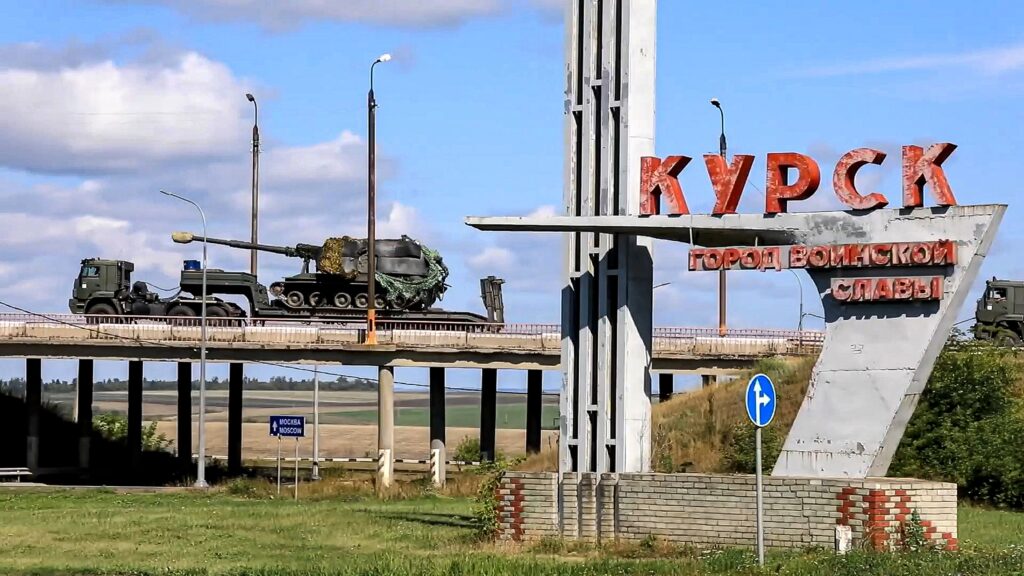 FILE - In this photo taken from video released by the Russian Defense Ministry on Aug. 9, 2024, a Russian military column moves to fight Ukrainian forces in the Sudzhansky district of the ​​Kursk region of Russia.