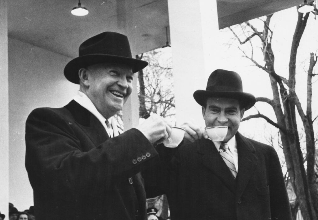 President Eisenhower (left) and his Vice-President Richard Nixon, drinking tea at the President's second Inauguration, Washington DC, January 1957. (Photo by