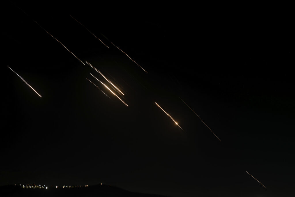 Missiles launched from Iran towards Israel are seen at the West Bank city of Nablus on Tuesday.