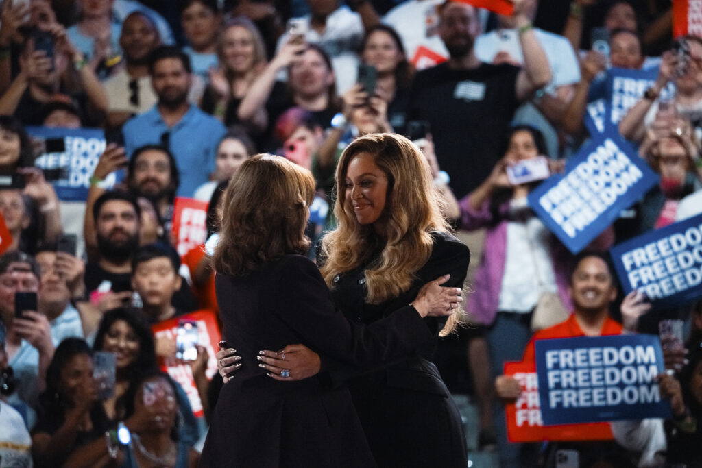 HOUSTON, TEXAS - OCTOBER 25: Democratic presidential nominee, Vice President Kamala Harris embraces singer Beyoncé at a campaign rally on October 25, 2024 in Houston, Texas. Harris is campaigning in Texas holding a rally supporting reproductive rights with recording artists Beyoncé and Willie Nelson.  (Photo by Jordan Vonderhaar/Getty Images)