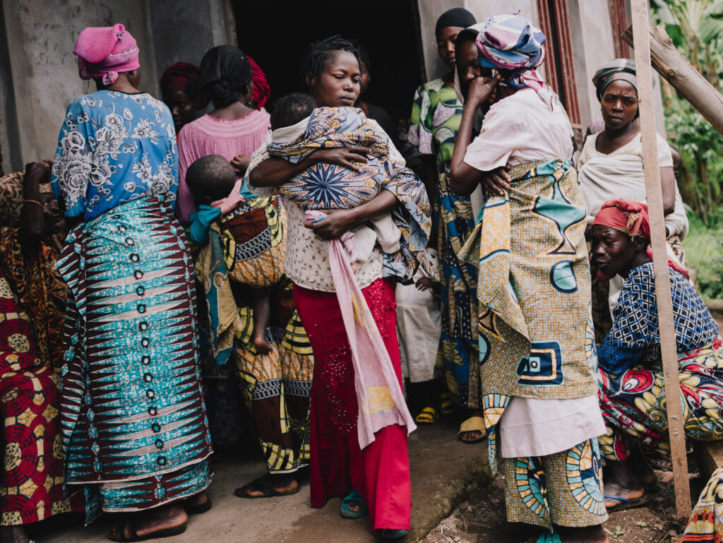 KISHINJI, DEMOCRATIC REPUBLIC OF CONGO - APRIL 4: Displaced community members who have fled the M23 conflict leave a  Escalating fighting between the Rwanda-backed M23 rebel group and pro-government forces in eastern Democratic Republic of the Congo has displaced hundreds of thousands of people in the eastern part of the country, swelling the population in Goma, the region's largest city.(Photo by Hugh Kinsella Cunningham/Getty Images)