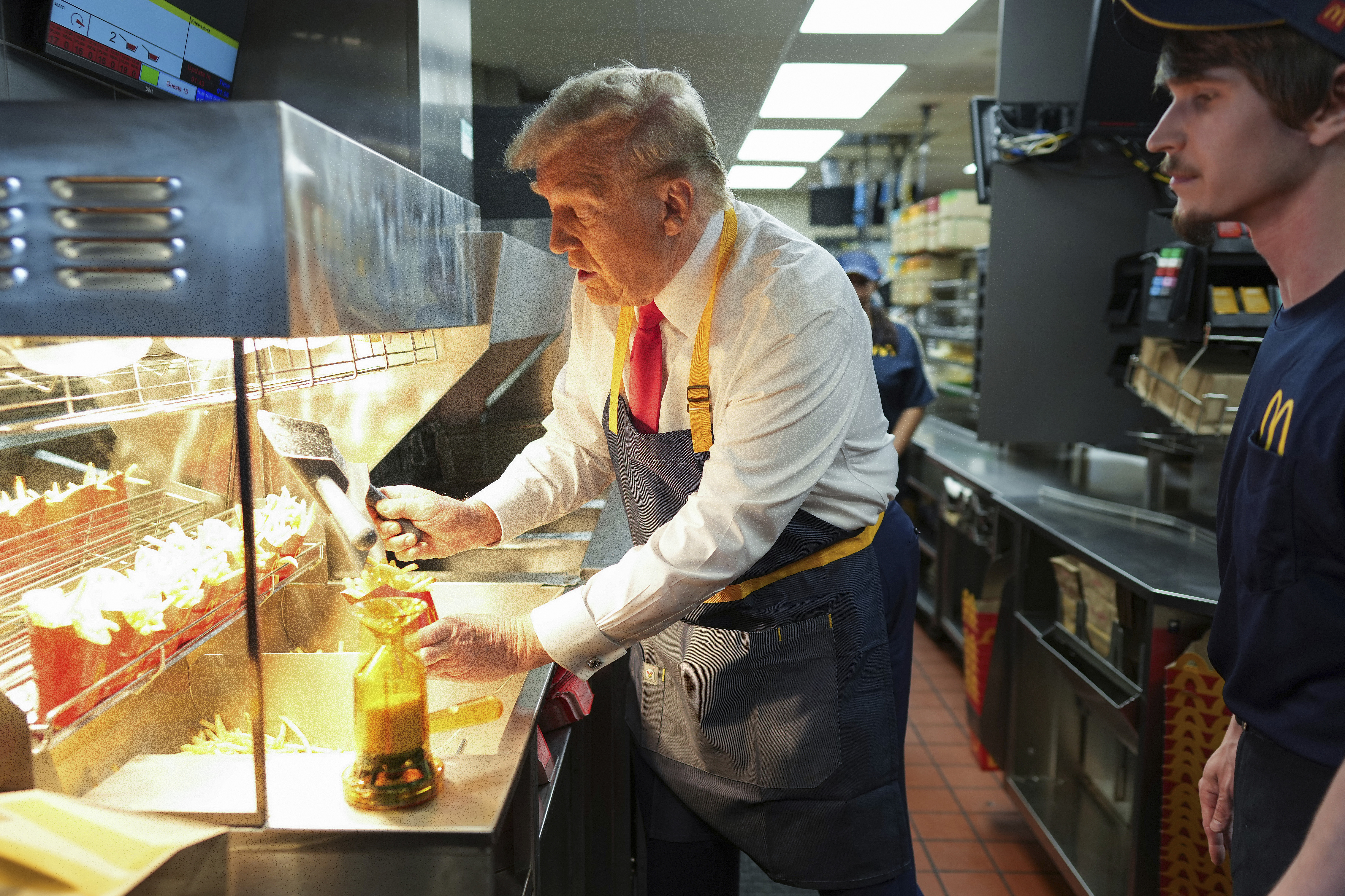 Trump Mans Drive-Thru at McDonald’s in Pennsylvania in Effort To Taunt Harris