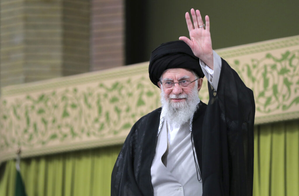 Ayatollah Ali Khamenei waves to the crowd during a meeting with school and university students at Tehran, November 2, 2024.