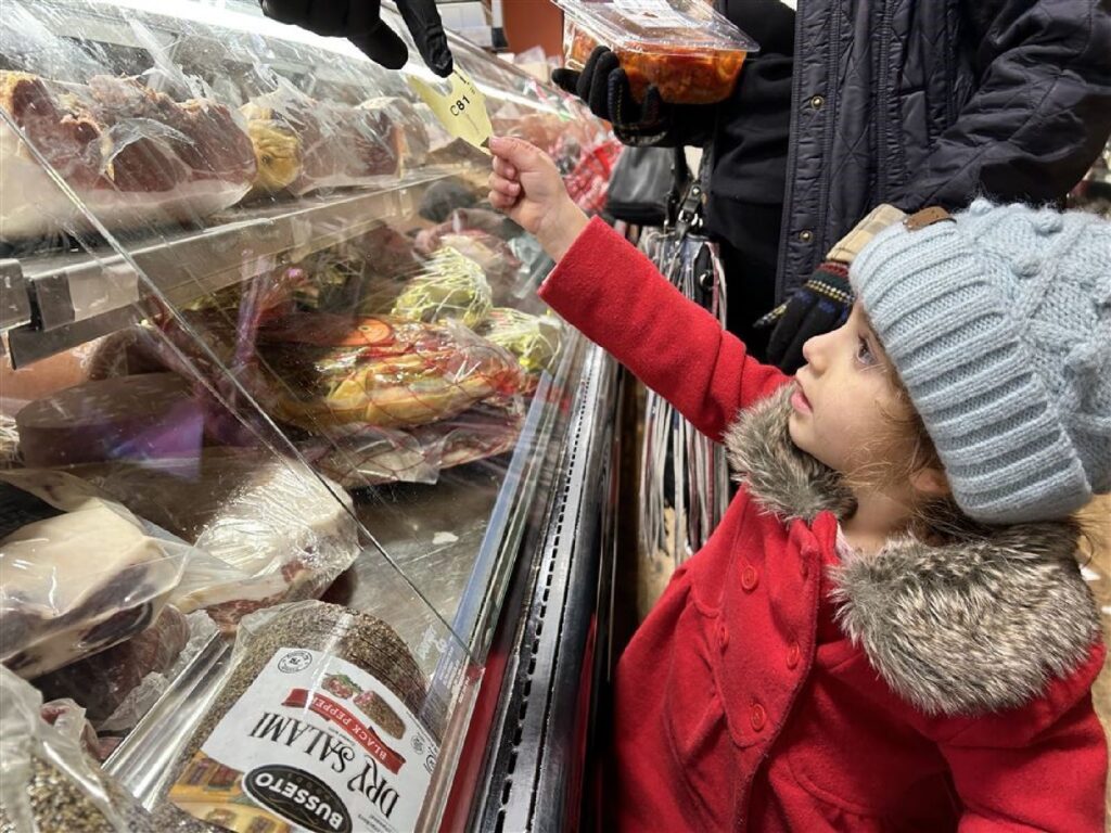 Like her immigrant Italian grandparents, Salena Zito started bringing her grandchildren to shop for the ingredients for the Feast of the Seven Fishes so they can carry the tradition on to the next generation.