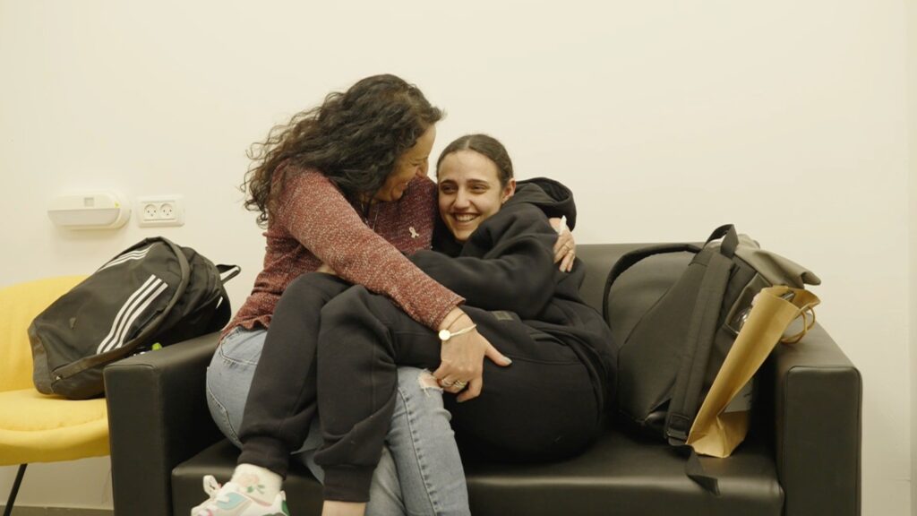 Romi Gonen, 24, kidnapped by Hamas terrorists at the Nova music rave reunites with her mother, Meirav today.