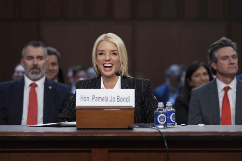 Pam Bondi, President-elect Donald Trump's choice to lead the Justice Department as attorney general, appears before the Senate Judiciary Committee for her confirmation hearing, at the Capitol in Washington, Wednesday, Jan. 15, 2025.&nbsp;(AP Photo/Ben Curtis)