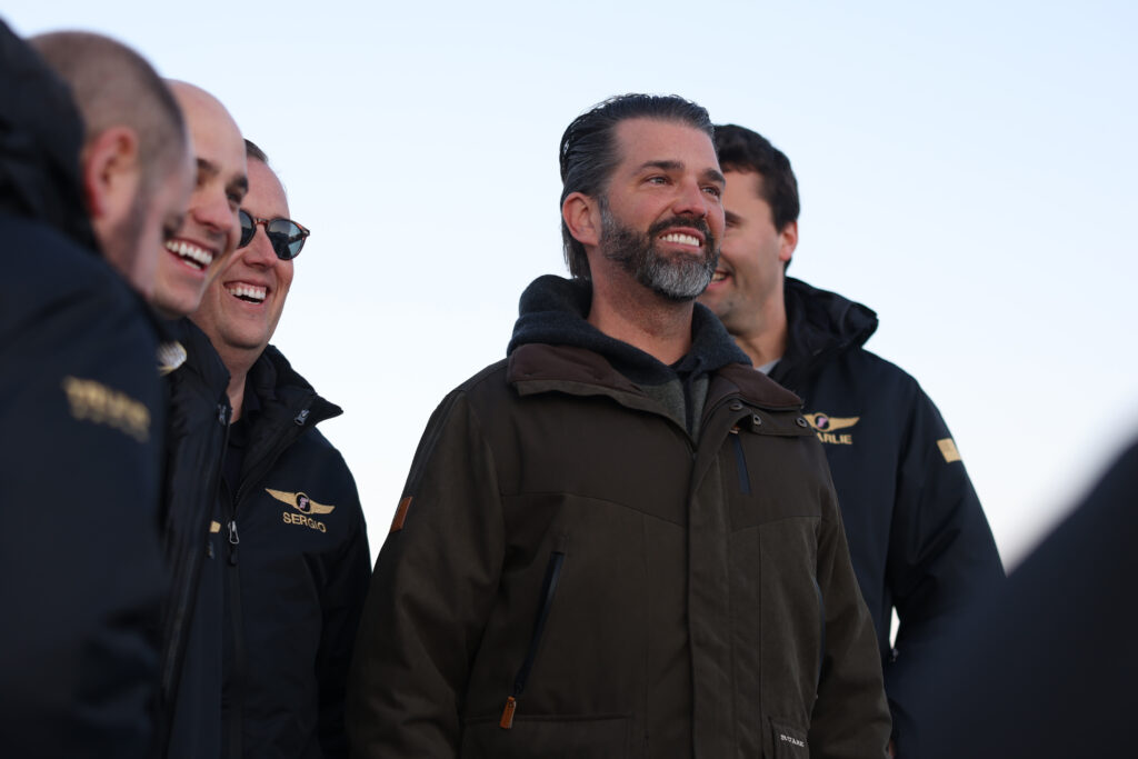 Donald Trump Jr., center, arrives in Nuuk, Greenland, Tuesday, Jan. 7, 2025. (Emil Stach/Ritzau Scanpix via AP)