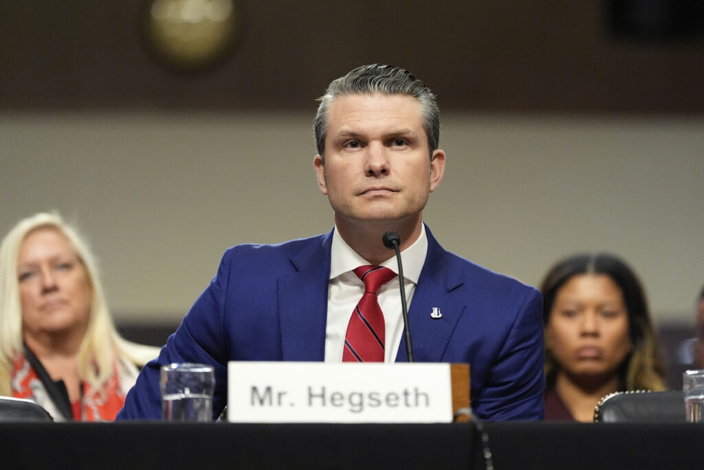 Pete Hegseth, President-elect Donald Trump's choice to be Defense secretary, appears before the Senate Armed Services Committee for his confirmation hearing, at the Capitol in Washington, Tuesday, Jan. 14, 2025. (AP Photo/Alex Brandon)