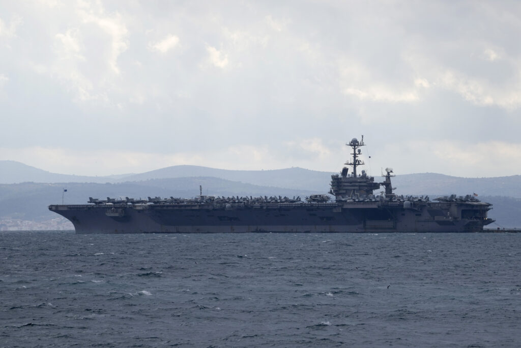 FILE - Aircraft carrier USS Harry S. Truman is moored near Split, Croatia, Feb. 14, 2022.