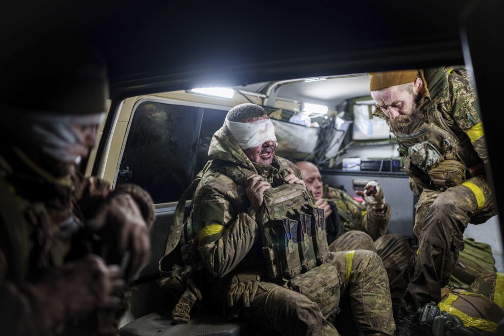 Injured Ukrainian servicemen arrive from the battlefield at Medical Service "Ulf" of the 108th Separate Battalion "Da Vinci Wolves" on Pokrovsk direction, Ukraine, Monday, Dec. 23, 2024.